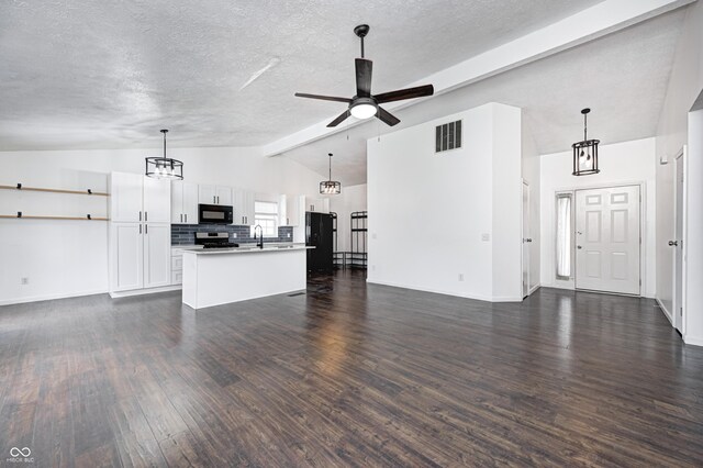 6036 Terrytown Pkwy, Indianapolis, IN 46254 - kitchen featuring open floor plan, a center island with sink, dark wood-style floors, visible vents, and black appliances