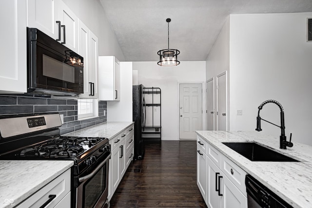 6036 Terrytown Pkwy, Indianapolis, IN 46254 - kitchen featuring dishwasher, dark wood finished floors, stainless steel range with gas cooktop, a sink, and black microwave