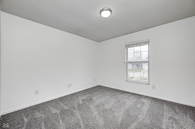 6036 Terrytown Pkwy, Indianapolis, IN 46254 - carpeted empty room with baseboards and a textured ceiling