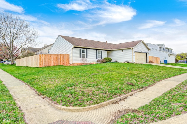 6036 Terrytown Pkwy, Indianapolis, IN 46254 - ranch-style house with fence, driveway, a front yard, and an attached garage