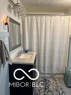 full bathroom with vanity