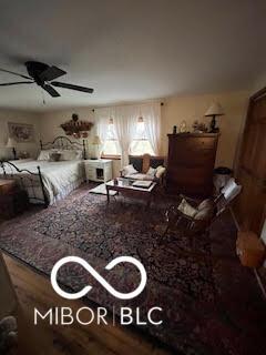 bedroom featuring wood finished floors