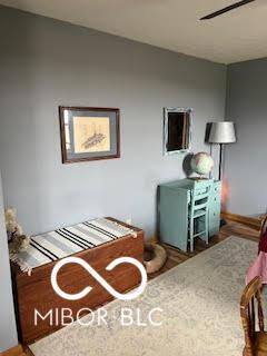 bedroom featuring wood finished floors