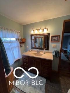 bathroom featuring vanity and tile patterned flooring