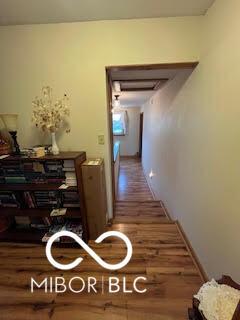 hall featuring wood finished floors
