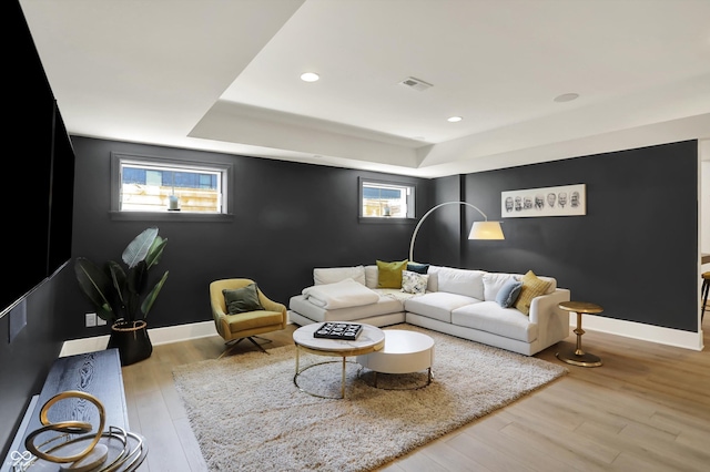 5130 Melbourne Pl, Zionsville, IN 46077 - living room with wood finished floors, a tray ceiling, baseboards, and recessed lighting