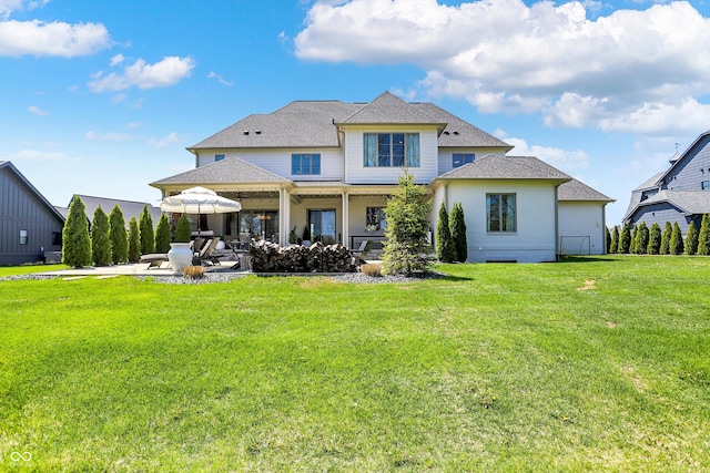 5130 Melbourne Pl, Zionsville, IN 46077 - rear view of house with a lawn, a patio area, and a shingled roof