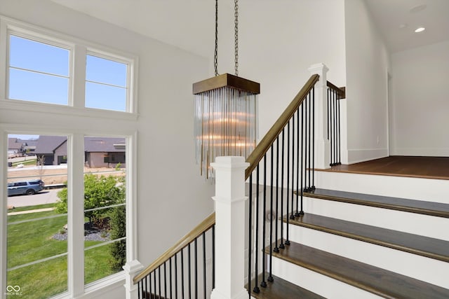 5130 Melbourne Pl, Zionsville, IN 46077 - stairs featuring a high ceiling, recessed lighting, and wood finished floors
