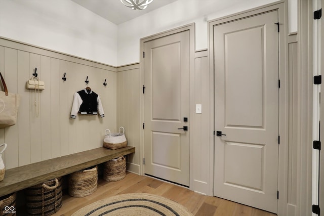 5130 Melbourne Pl, Zionsville, IN 46077 - mudroom with light wood-type flooring and wainscoting