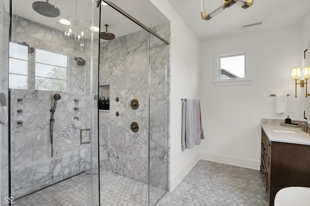 5130 Melbourne Pl, Zionsville, IN 46077 - bathroom with vanity, a marble finish shower, baseboards, and a chandelier