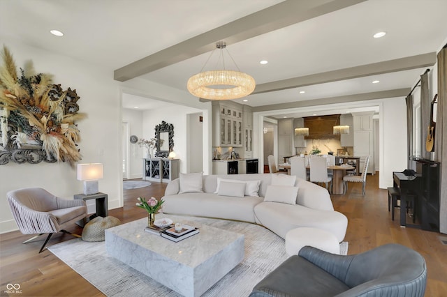 5130 Melbourne Pl, Zionsville, IN 46077 - living area featuring wood finished floors, recessed lighting, a chandelier, and baseboards