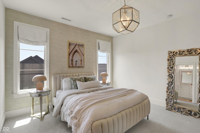 5130 Melbourne Pl, Zionsville, IN 46077 - carpeted bedroom featuring a chandelier and baseboards