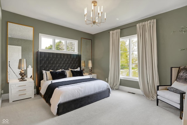 5130 Melbourne Pl, Zionsville, IN 46077 - carpeted bedroom with a chandelier and baseboards