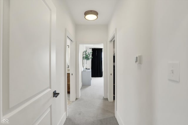 5130 Melbourne Pl, Zionsville, IN 46077 - corridor featuring baseboards and light carpet