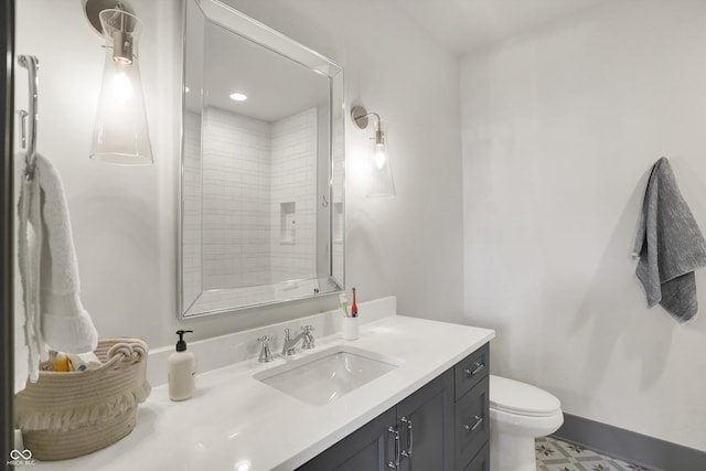 5130 Melbourne Pl, Zionsville, IN 46077 - bathroom featuring vanity, toilet, and tiled shower