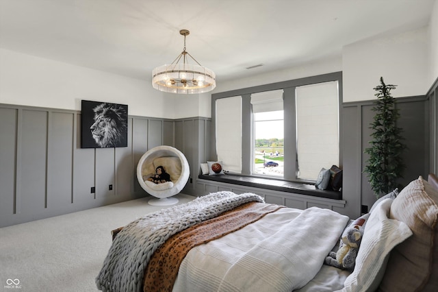 5130 Melbourne Pl, Zionsville, IN 46077 - bedroom featuring a decorative wall, a chandelier, carpet, and a wainscoted wall