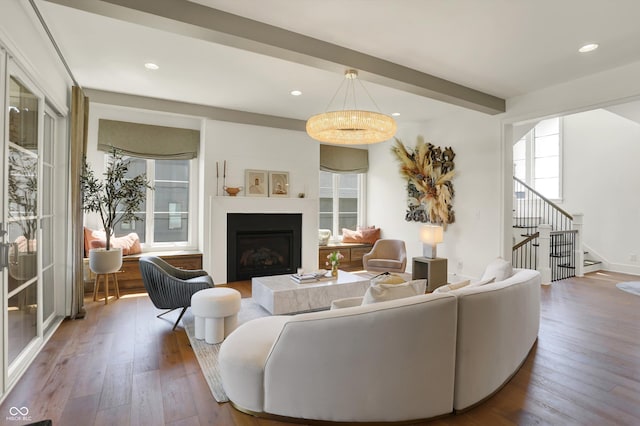 5130 Melbourne Pl, Zionsville, IN 46077 - living room featuring hardwood / wood-style floors, stairway, a fireplace, and recessed lighting