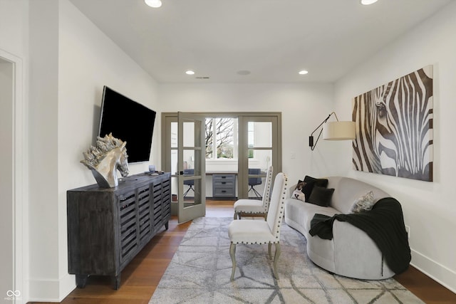 5130 Melbourne Pl, Zionsville, IN 46077 - living room featuring french doors, recessed lighting, wood finished floors, and baseboards