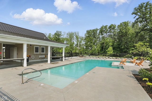 5130 Melbourne Pl, Zionsville, IN 46077 - community pool with a patio area and view of scattered trees