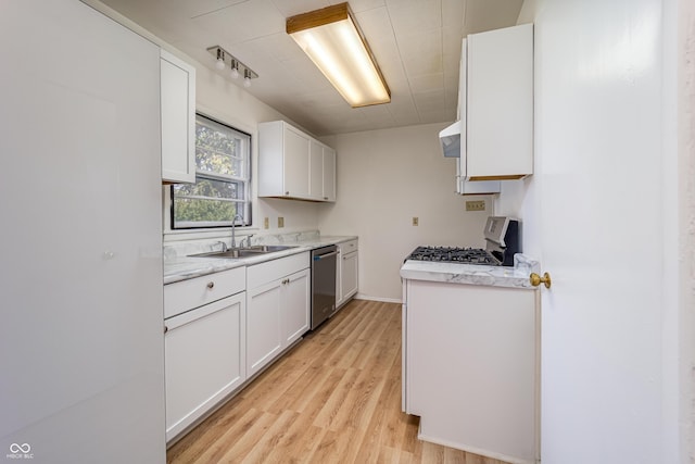 3510 Chamberlin Dr, Indianapolis, IN 46237 - kitchen with white cabinets, gas stove, a sink, dishwasher, and light countertops