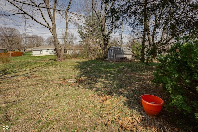 3510 Chamberlin Dr, Indianapolis, IN 46237 - view of yard featuring an outbuilding and a shed