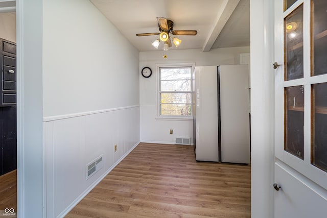 3510 Chamberlin Dr, Indianapolis, IN 46237 - interior space featuring beamed ceiling, ceiling fan, visible vents, and light wood-style floors