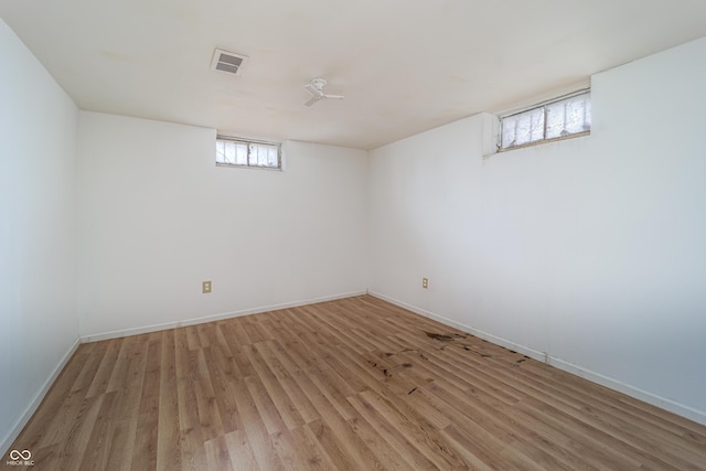 3510 Chamberlin Dr, Indianapolis, IN 46237 - below grade area with baseboards, visible vents, and light wood finished floors