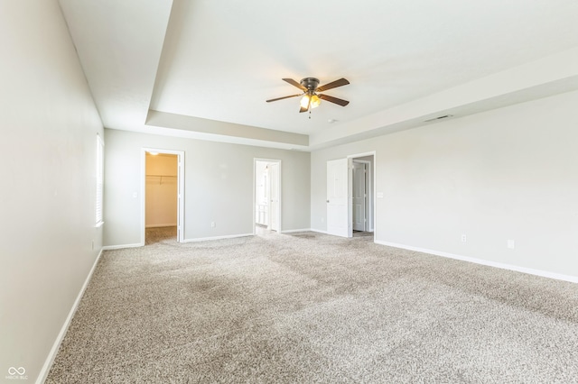 4747 Summit Lake Pl, Indianapolis, IN 46239 - carpeted spare room with baseboards, visible vents, a ceiling fan, and a raised ceiling