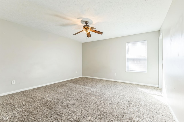 4747 Summit Lake Pl, Indianapolis, IN 46239 - spare room with a textured ceiling, ceiling fan, baseboards, and carpet
