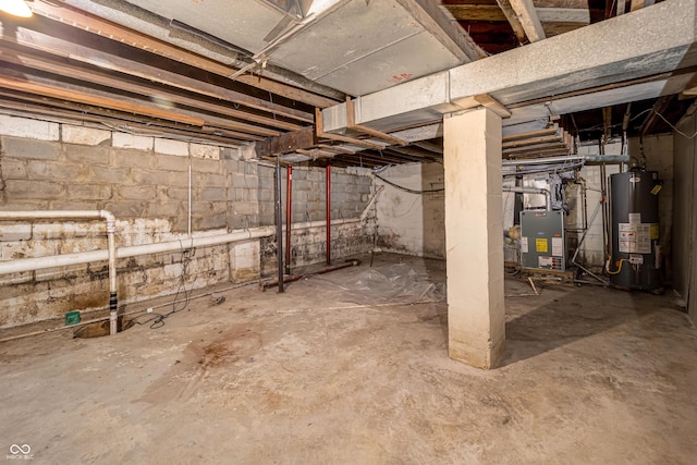 2134 Dawson St, Indianapolis, IN 46203 - unfinished below grade area featuring heating unit and gas water heater