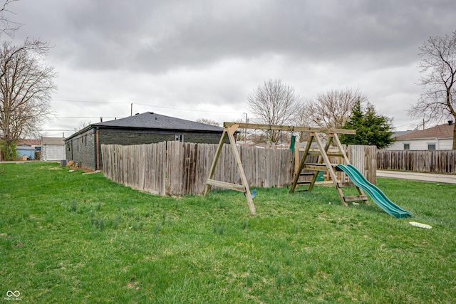 2134 Dawson St, Indianapolis, IN 46203 - view of jungle gym with fence and a yard