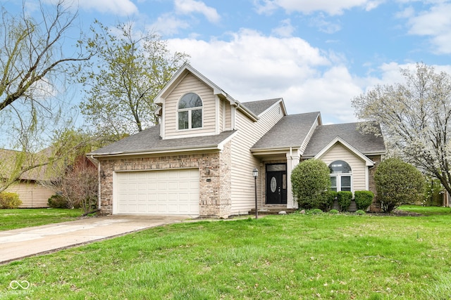 traditional-style home with an attached garage, driveway, and a front lawn
