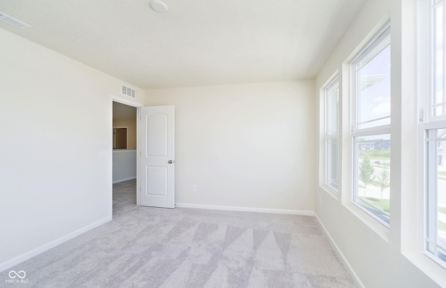 3241 Fawn Cir, Brownsburg, IN 46112 - unfurnished room with light colored carpet and baseboards