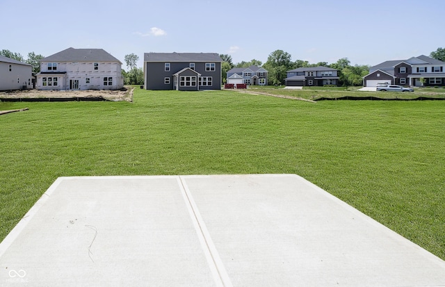 3241 Fawn Cir, Brownsburg, IN 46112 - view of grassy yard featuring a patio area and a residential view