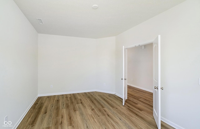 3241 Fawn Cir, Brownsburg, IN 46112 - empty room with light wood-style flooring and baseboards
