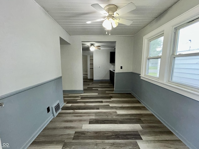 1627 E 8th St, Anderson, IN 46012 - interior space featuring baseboards, visible vents, wood finished floors, and a ceiling fan
