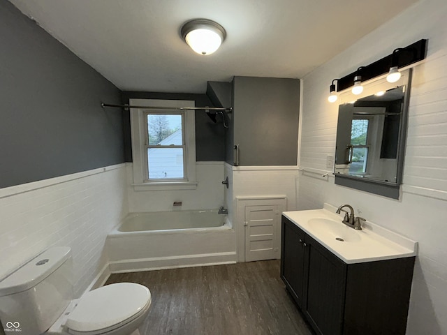 1627 E 8th St, Anderson, IN 46012 - full bathroom featuring vanity, toilet, wood finished floors, and wainscoting