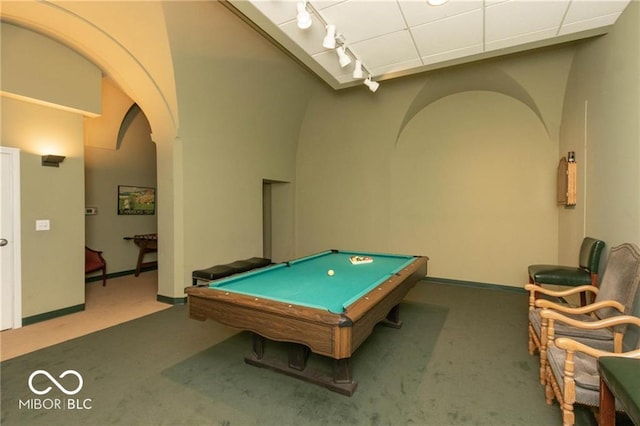 recreation room with arched walkways, rail lighting, billiards, and carpet