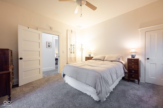 carpeted bedroom with a ceiling fan