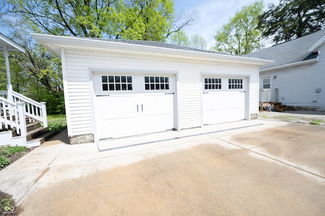 garage featuring driveway
