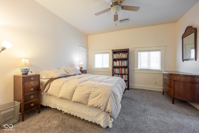 carpeted bedroom with baseboards, visible vents, ceiling fan, and lofted ceiling