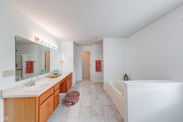 5989 Ashmore Ln, Carmel, IN 46033 - full bathroom featuring marble finish floors, vanity, a bath, and an enclosed shower