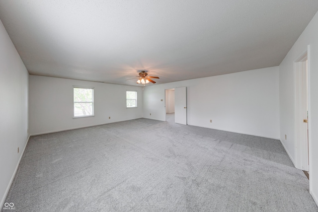 5989 Ashmore Ln, Carmel, IN 46033 - carpeted spare room with ceiling fan and baseboards