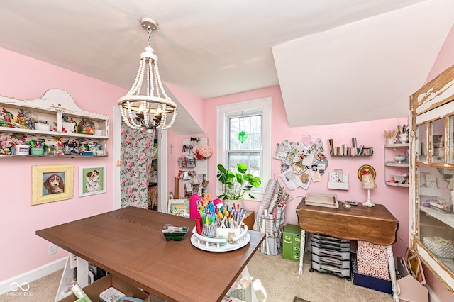 dining space featuring baseboards, carpet flooring, and a notable chandelier