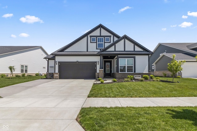 15755 Scher Dr, Westfield, IN 46074 - view of front of home with driveway, an attached garage, a front lawn, and brick siding