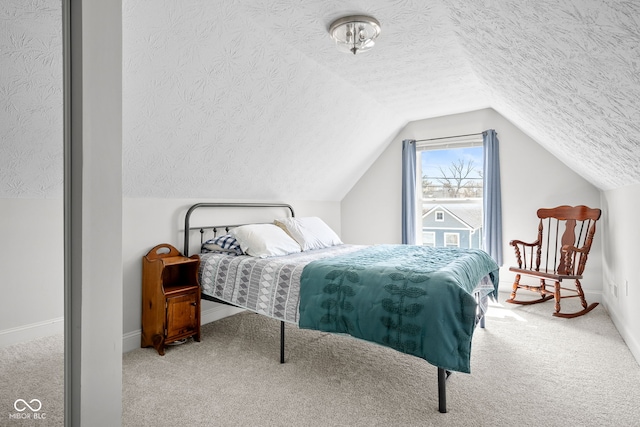 358 Terrace Ave, Indianapolis, IN 46225 - carpeted bedroom with baseboards, vaulted ceiling, and a textured ceiling