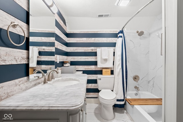 358 Terrace Ave, Indianapolis, IN 46225 - bathroom with visible vents, marble finish floor, toilet, vanity, and shower / tub combo with curtain