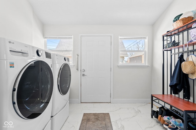 358 Terrace Ave, Indianapolis, IN 46225 - laundry area with marble finish floor, washing machine and dryer, laundry area, and plenty of natural light