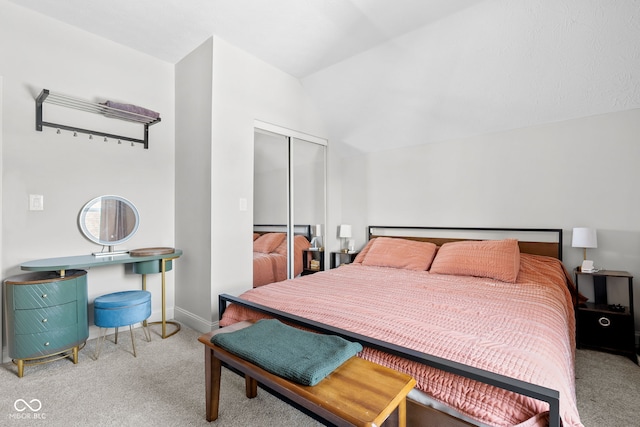 358 Terrace Ave, Indianapolis, IN 46225 - carpeted bedroom with baseboards, a closet, and vaulted ceiling