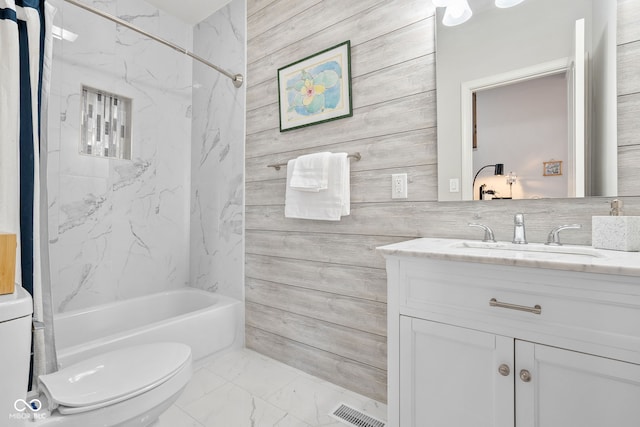 358 Terrace Ave, Indianapolis, IN 46225 - full bath with vanity, toilet, marble finish floor, tub / shower combination, and visible vents